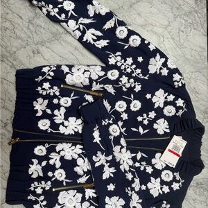 Michael Kors Navy Jacket with White Floral Embroidery, fits a little large